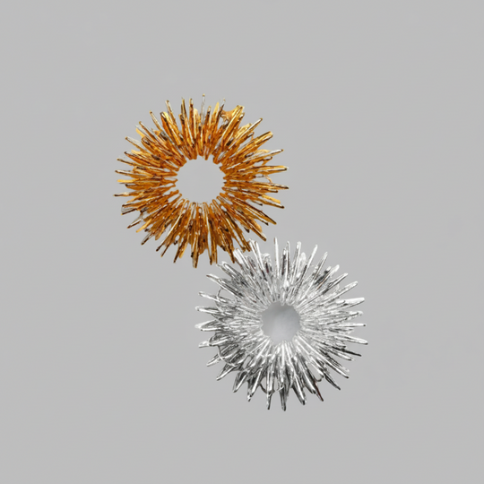 Spring steel finger massage rings. Welded ends for extra durability. A finger massage ring is a small, spiked ring designed to be rolled up and down your fingers. It stimulates acupressure points, improves blood circulation, and relieves tension or stiffness in the fingers. Commonly used in reflexology and as a stress-relief tool, it's beneficial for anyone who spends long periods typing, writing, or performing tasks that strain the hands and fingers. The gentle pressure from the ring promotes relaxation an