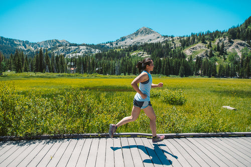 Trail runner in the mountains — Rhino skin care for endurance athletes.