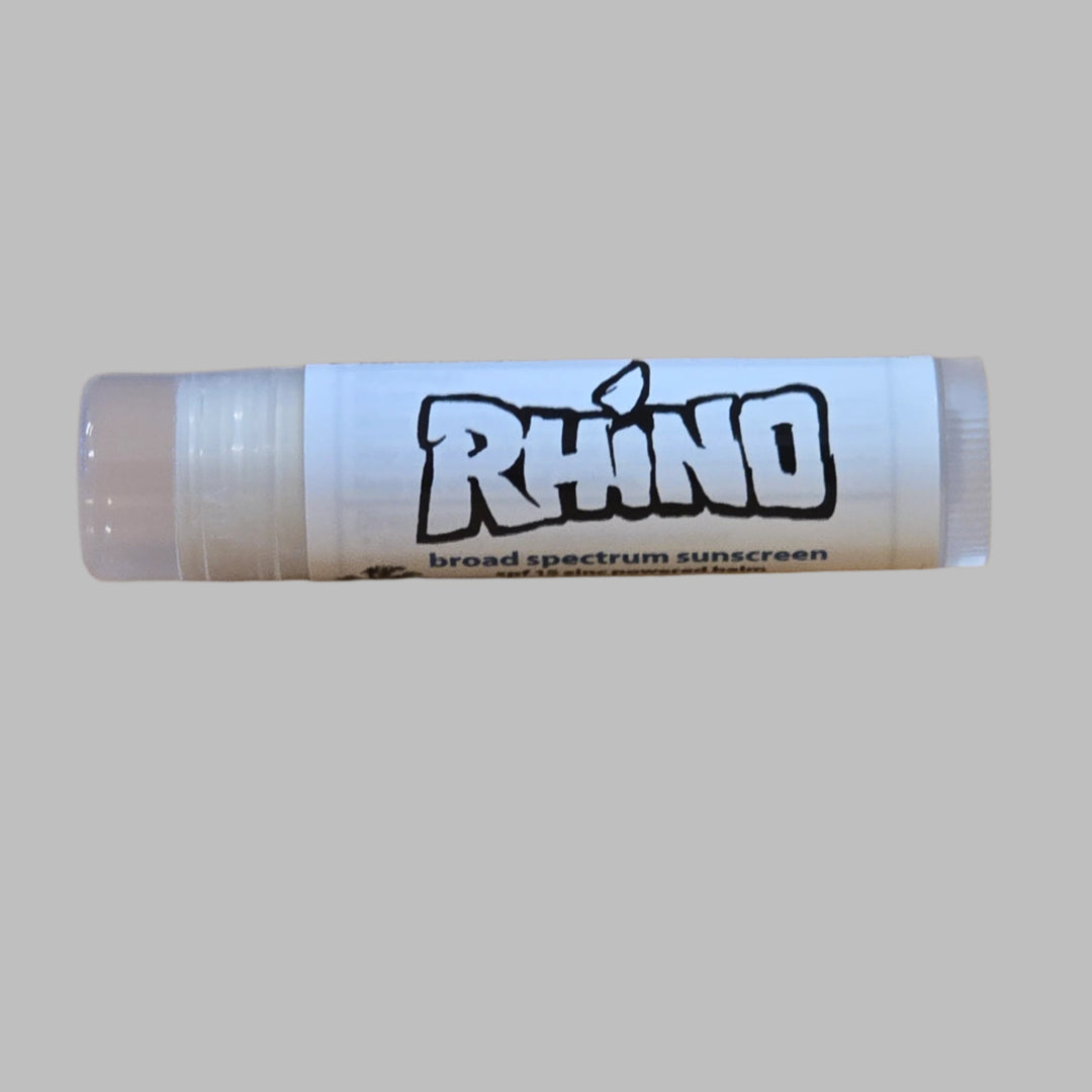 "Rhino Skin Solutions Reef Safe SPF 15 Zinc Lip Balm with eco-friendly ingredients and vanilla scent for sun protection and hydration."