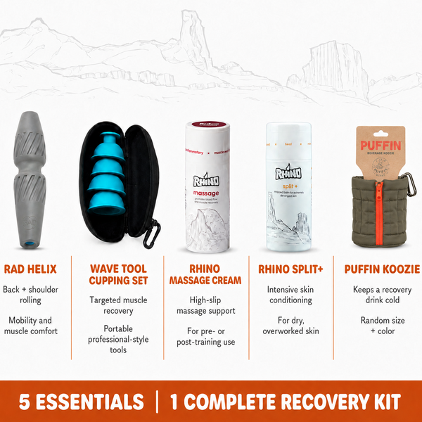 A recovery kit set of five massage and muscle tools displayed on a white background with a faint mountain outline. The products include a gray and black Rad Helix roller, a black Wave Tool Cupping Set with blue inserts, a white Rhino Massage Cream tube, a white Rhino Massage Split+ tube, and a brown Puffin Koozie pouch with an olive strap.