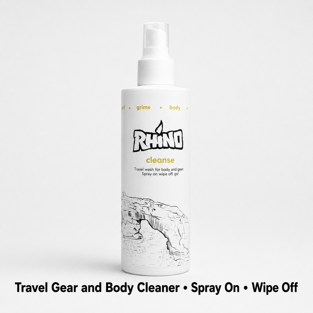 A white spray bottle of Rhino Cleanse travel gear and body cleaner, shown against a light gray background with a black text banner at the bottom.