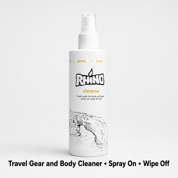A white spray bottle of Rhino Cleanse travel gear and body cleaner, shown against a light gray background with a black text banner at the bottom.
