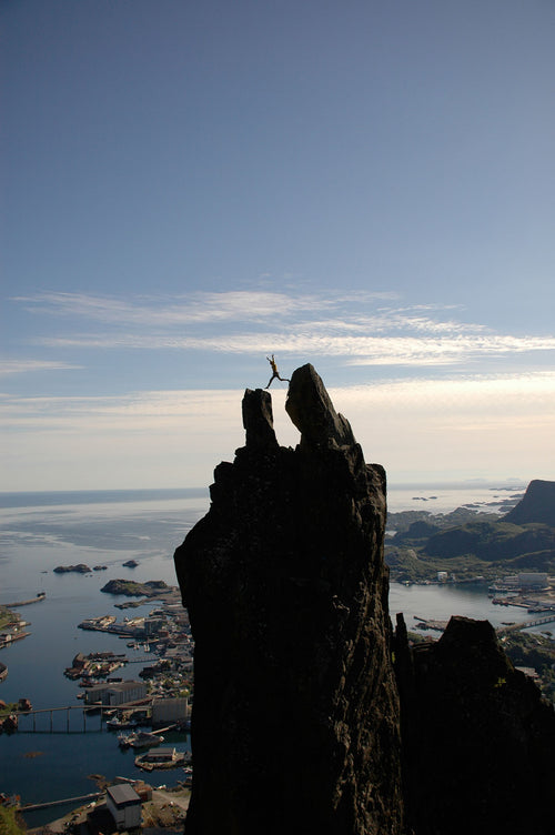 Climbing in the Lofoten Islands, Norway — granite walls above the sea.