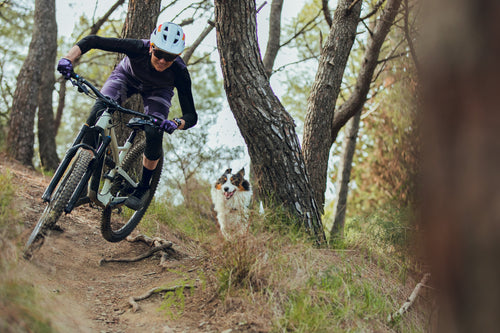 Mountain biker riding singletrack — Rhino skin care for MTB riders.