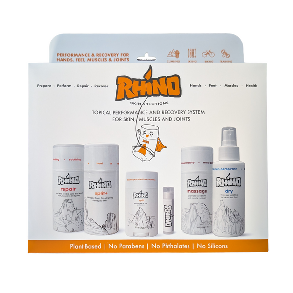 Rhino topical performance and recovery system packaging with various bottles on a white background