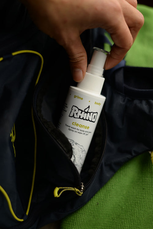 Rhino Cleanse spray shown with outdoor gear