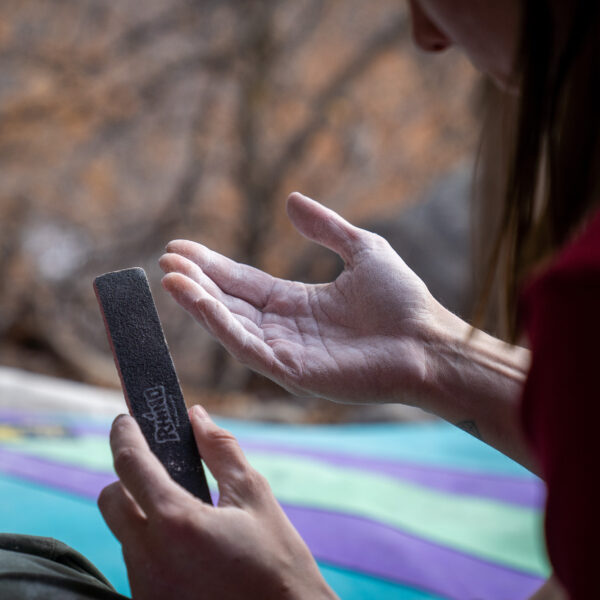 Take care of your skin with the Rhino 80/100 Grit Skin File, the ideal tool for climbers who need to manage callouses, splits, and tears effectively. This dual-textured file is designed to quickly smooth out rough, thickened skin, reducing the risk of flappers and rips during your climbs. Consistent use will help increase your skin’s strength and durability, ensuring you can push your limits without worrying about skin injuries.