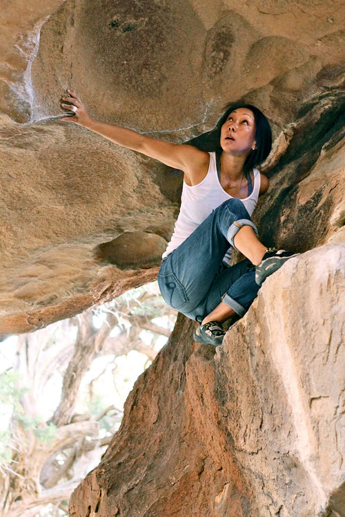 Climber Selena bouldering in Hueco Tanks — Rhino Skin Solutions athlete community.