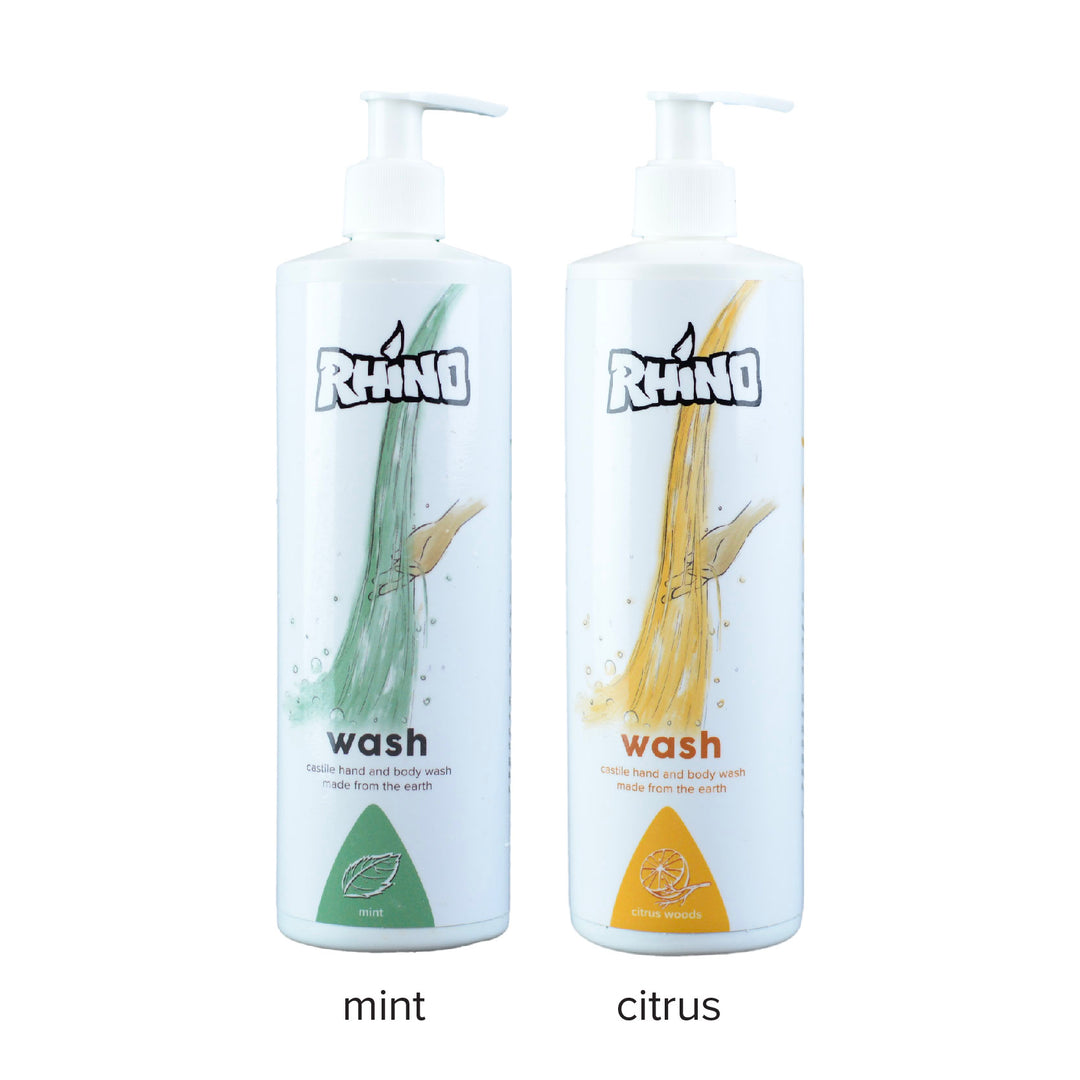 Rhino Wash bottle set against a gym background, formulated for Jiu Jitsu practitioners. This soap provides deep cleansing and skin care benefits, designed to wash away sweat, grime, and mat bacteria. Perfect for athletes seeking a refreshing and skin-friendly solution after intense training sessions